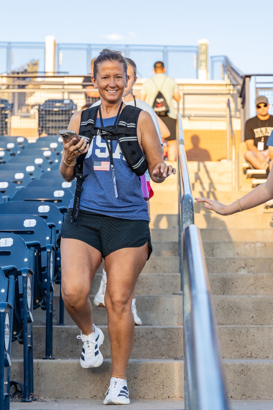 Civilian climber smiling on the stairs